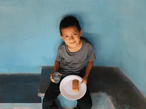 Providing nutritious food and clean water to children in need through ADRA International programs.
