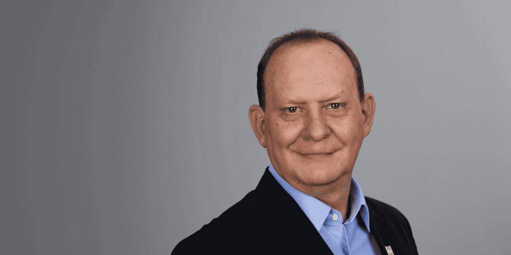 ADRA International representative smiling in a professional portrait.