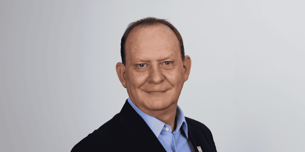 ADRA International logo and Thierry Van Bignoot portrait.